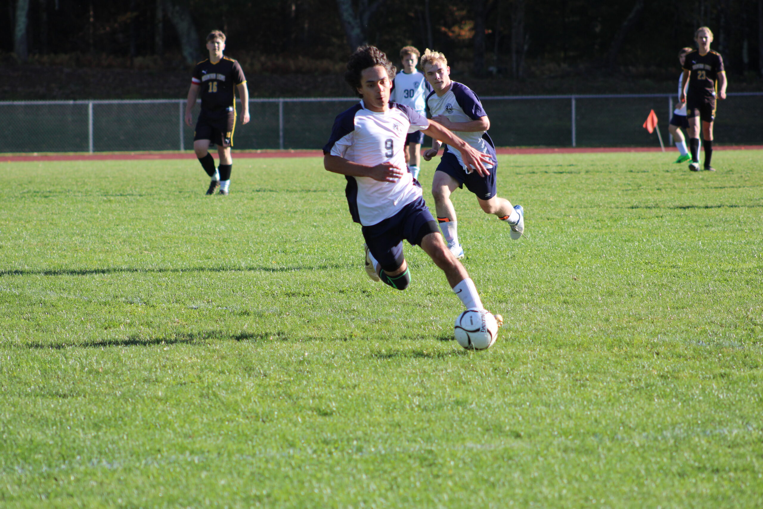 Grace soccer players competing on the field