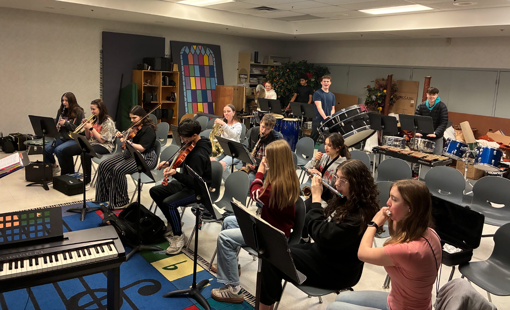 Grace students rehearsing instrumental music together