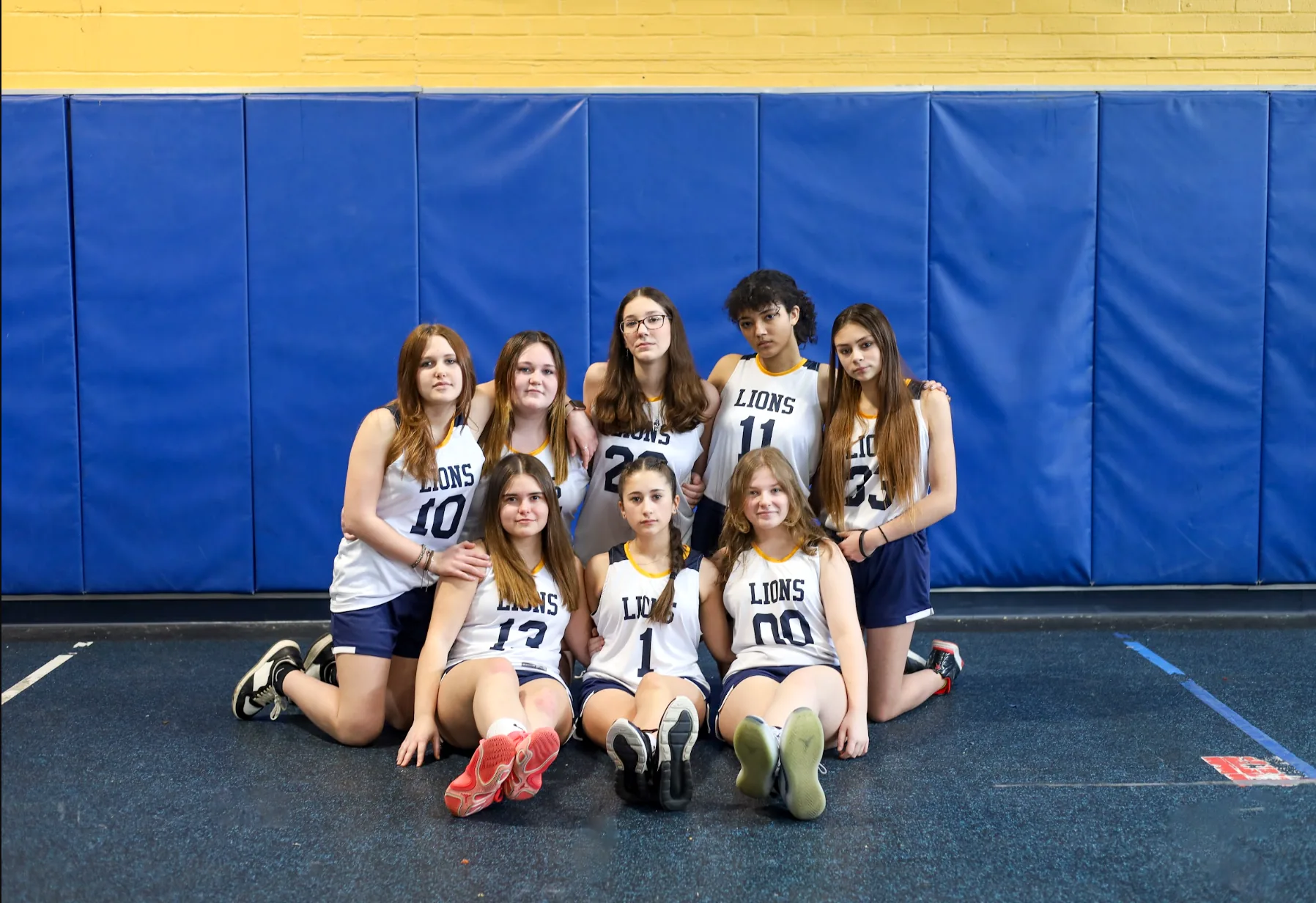 Grace Christian School girls basketball team together