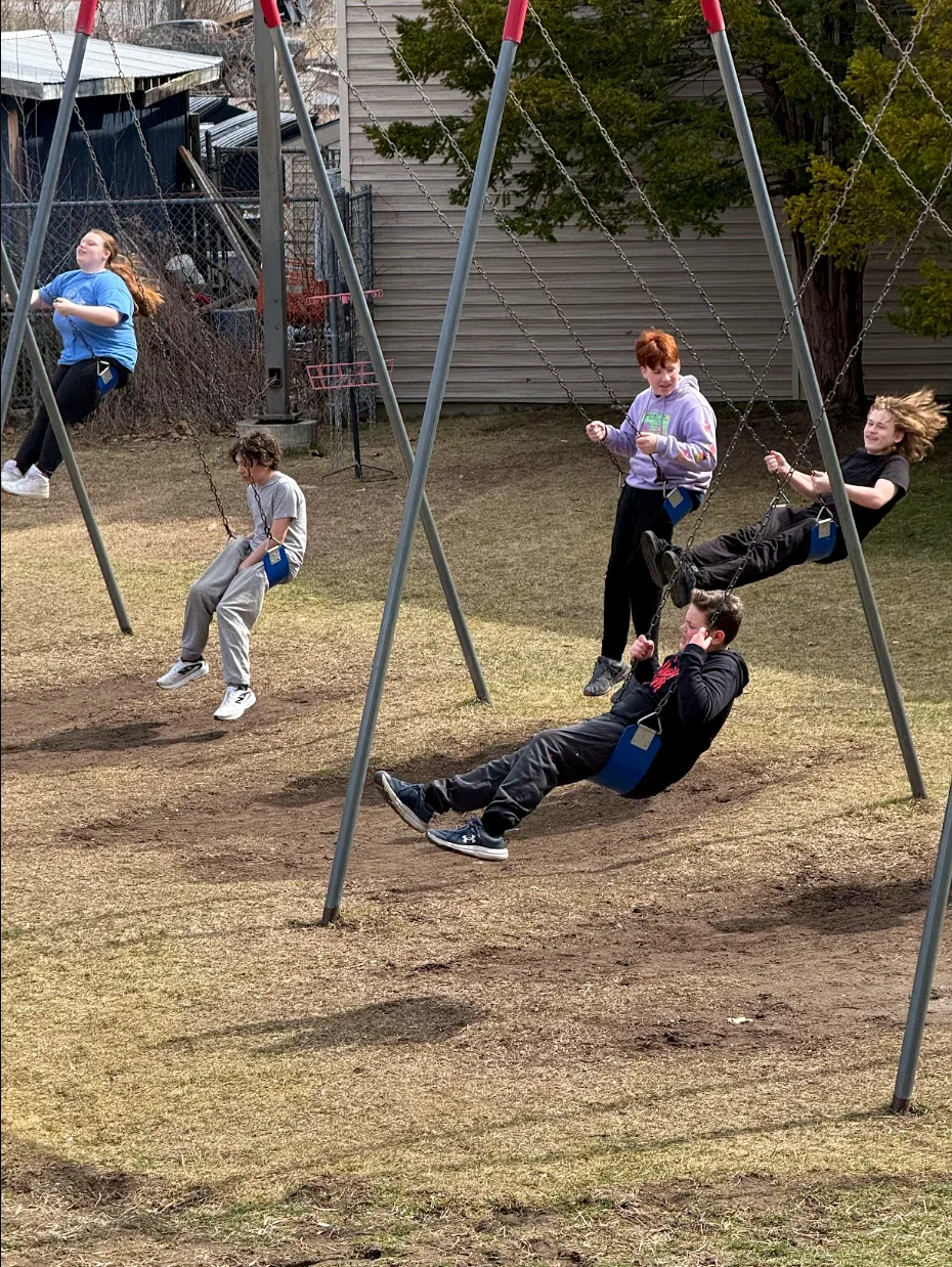 Grace Christian School junior high students enjoying time together on the playground
