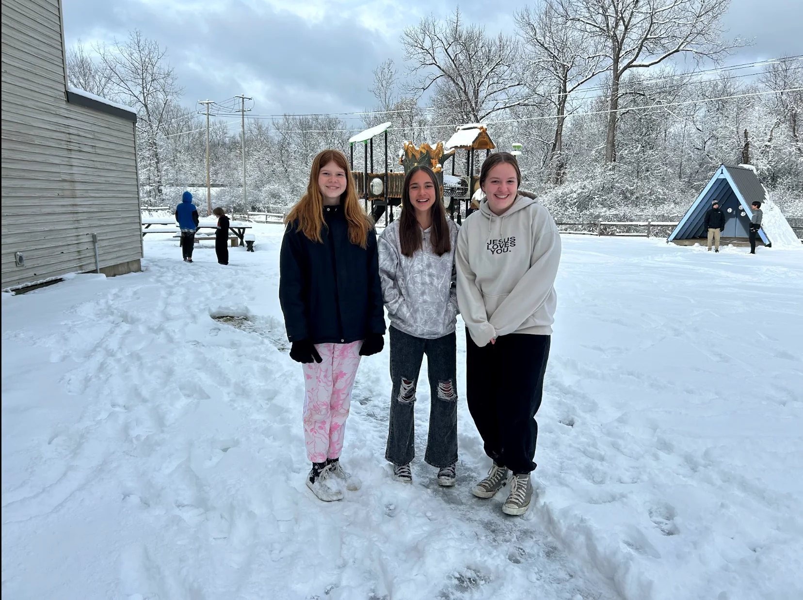 Grace Christian School students enjoying time together outdoors on a snowy day